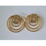 A pair of large concentric clip on earrings