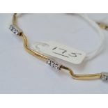 A bracelet with white stones in 9ct - marked 375 - 5.2gms