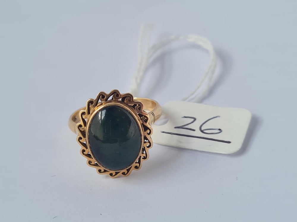 A star sapphire ring in 14ct gold - size O - 4gms