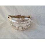 A Georgian style boat shaped basket with swing handle 5 inches wide Sheffield 1895 by W&H 228 gms