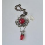 A silver plated arts & crafts pendant