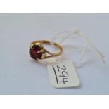 A solitaire garnet ring set in gold - size N - 2.2gms