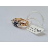 A sapphire & diamond 3 stone ring in 9ct - full hallmarks - size N - 3.6gms