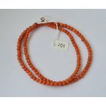 A graduated coral necklace - 23" long - damaged clasp