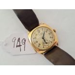 A gents wrist watch by WALKER in 9ct gold