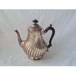 A late Georgian coffee pot with spiral twist decoration and tucked in base 9 inches high London 1831