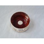 A silver mounted bottle coaster with wood base 3 3/4 inches dia