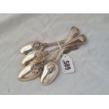 A set of four William IV shell decorated crested tea spoons 3x 1831 by WE the 4th Sheffield 141 gms