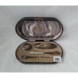 A boxed manicure set with beaded edges B'ham 1942