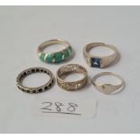 Five assorted silver rings