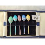 Five Enamel decorated coffee spoons in fitted box