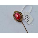 A large cabochon garnet stick pin with Victorian registration mark - 15ct gold tested