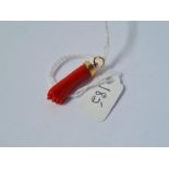 A coral hand pendant mounted in gold