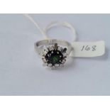 A stylish central tourmaline cluster ring in high carat white gold - guarantee over 12ct gold - size