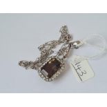 An art deco silver smokey quartz pendant necklace