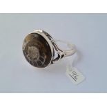 An unusual silver bangle with fossil inset - 57gms