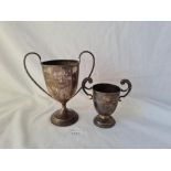 Two trophy cups with loop handles one 6 inches high 200 gms