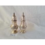 A pair of baluster shaped Georgian style peppers 3 1/2 inches high B'ham 1927 by E & Co 85 gms