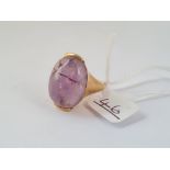 A large cabochon amethyst ring in 9ct - size J - 12.4gms