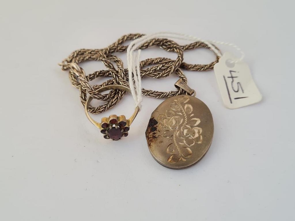 A fancy silver chain, locket & ring
