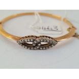 AN ATTRACTIVE GOLD & DIAMOND BANGLE INTERTWINED DESIGNED - 8.7gms