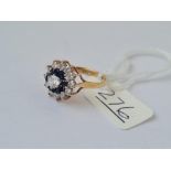 A dress ring with white & blue multi stones in 9ct - full hallmarks - sixe K - 2.1gms