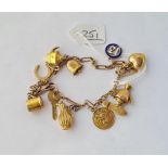 AN EDWARDIAN CHARM BRACELET IN 9CT - 12gms