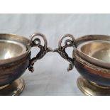 A pair of Victorian silver and turned wood 2 handled salts 3 1/4 inches wide B'ham 1871 by TH&S