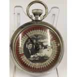 A vintage gaming pocket watch (when wound the mechanical arm spins round landing randomly on a