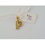 A vintage gold diamond set letter P in 18ct gold