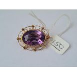 A vintage amethyst brooch in 9ct - 7.8gms