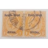 S W AFRICA SG7a (1923/1sh shiny ink op). Horizontal used pair, possible perf separation at base,
