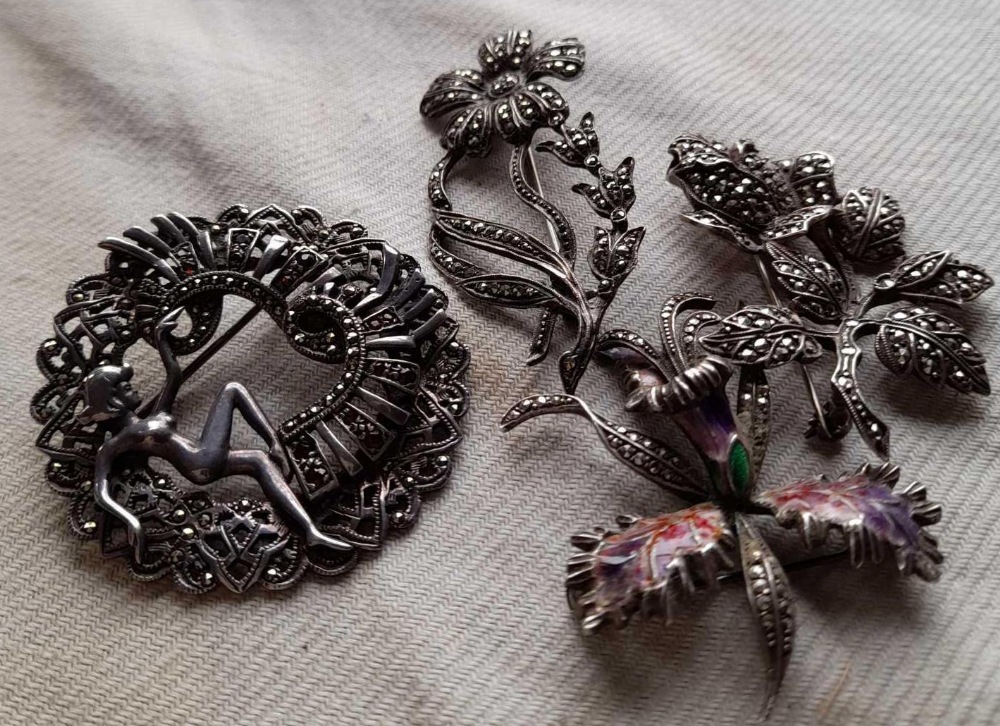 Four assorted marcasite brooches