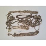 A quantity of assorted silver chains