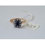 A multi stone dress ring in 9ct & silver - hallmarked - size V - 2.7gms