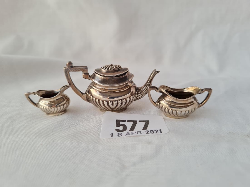 A miniature half fluted three piece tea set B'ham 1968