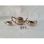 A miniature half fluted three piece tea set B'ham 1968