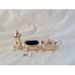 A three piece cruet set with gadroon rims B'ham 1969 132 gms excluding BGL's