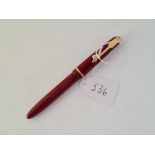 A maroon PARKER fountain pen with 14ct gold nib