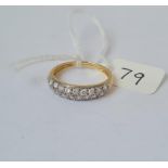 A multi stone ring in 14ct yellow gold - full hallmarks - size P - 2.3gms