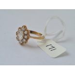 A multi stone dress ring in 9ct - full hallmarks - size P - 3.1gms