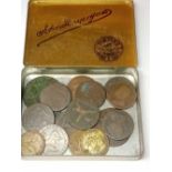 A tin of 18th and 19th Century Tokens