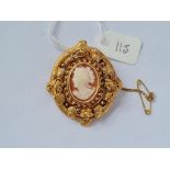 A ornate cameo brooch in gold frame - 11gms