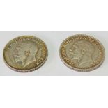 1911 and 1936 first and last shillings of George V