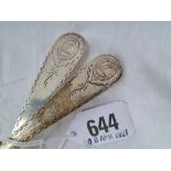 A pair of George III bright cut crested table spoons London 1780 by WT 126 gms