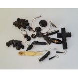 A bag of assorted black jewellery