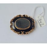 An antique enamel mourning brooch in 9ct