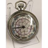 A vintage gaming pocket watch (when wound the mechanical arm spins round landing randomly on a