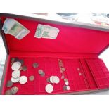 A good quality collection case with some coins