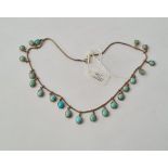 An Edwardian silver gilt turquoise necklace